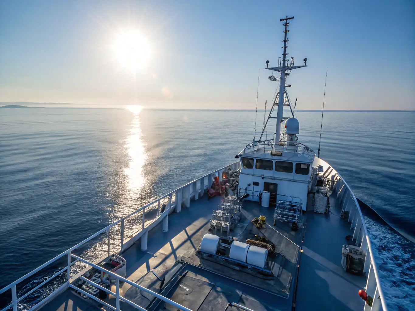 The Vikmar eXplorer, a state-of-the-art vessel equipped with advanced marine technology, conducting a seabed survey in clear blue waters.